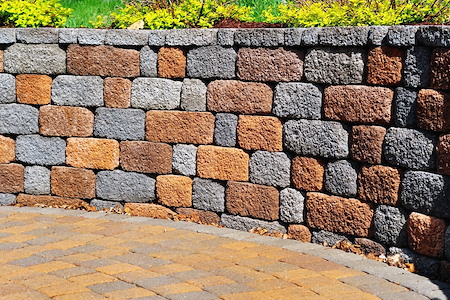 Retaining wall solutions for sloped portland yards best materials for soil erosion